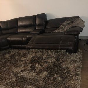 Sectional. Reclines on the right and left end